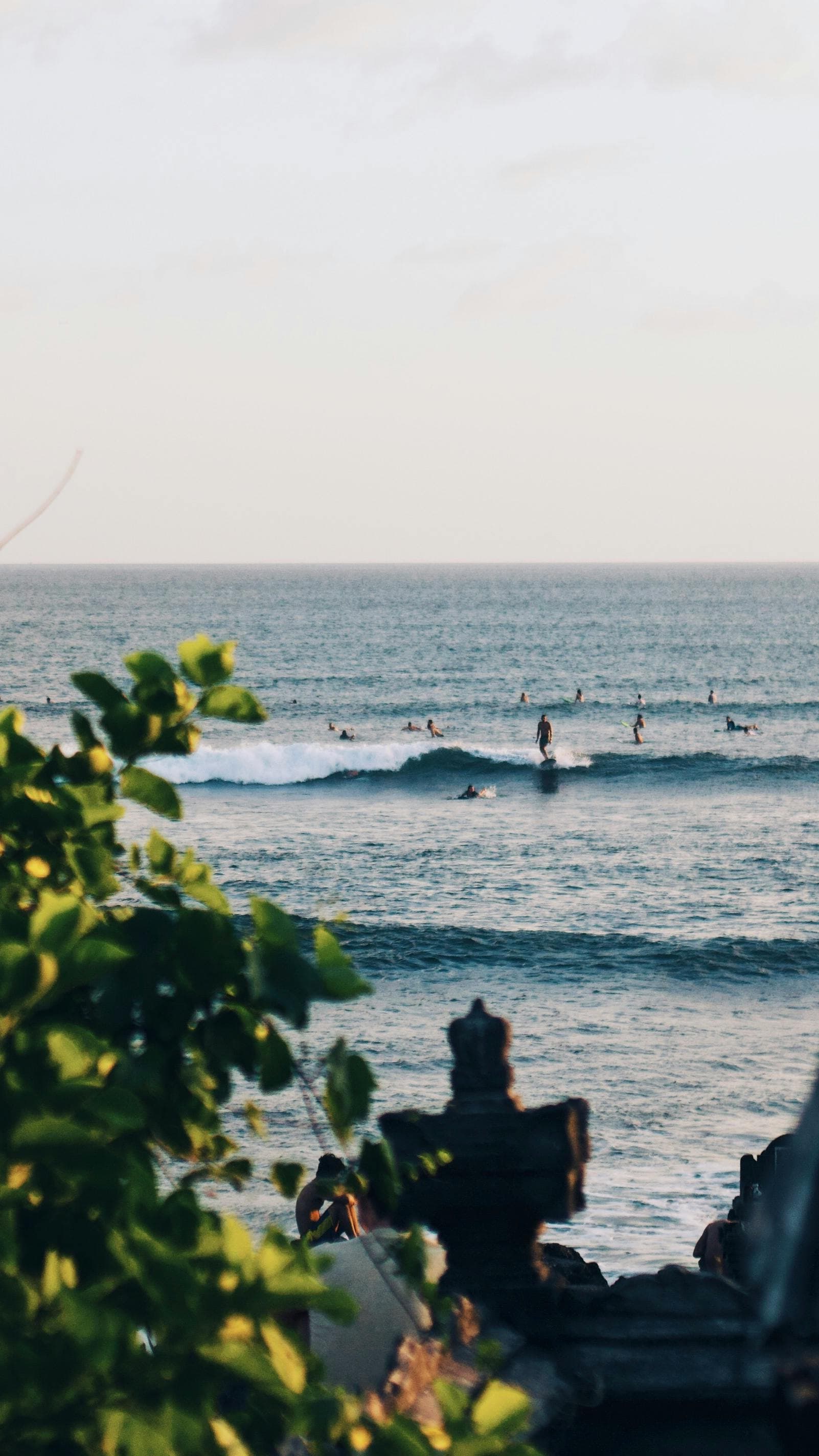 Canggu surf lesson Batu Bolong beach traditional Balinese ocean worship site