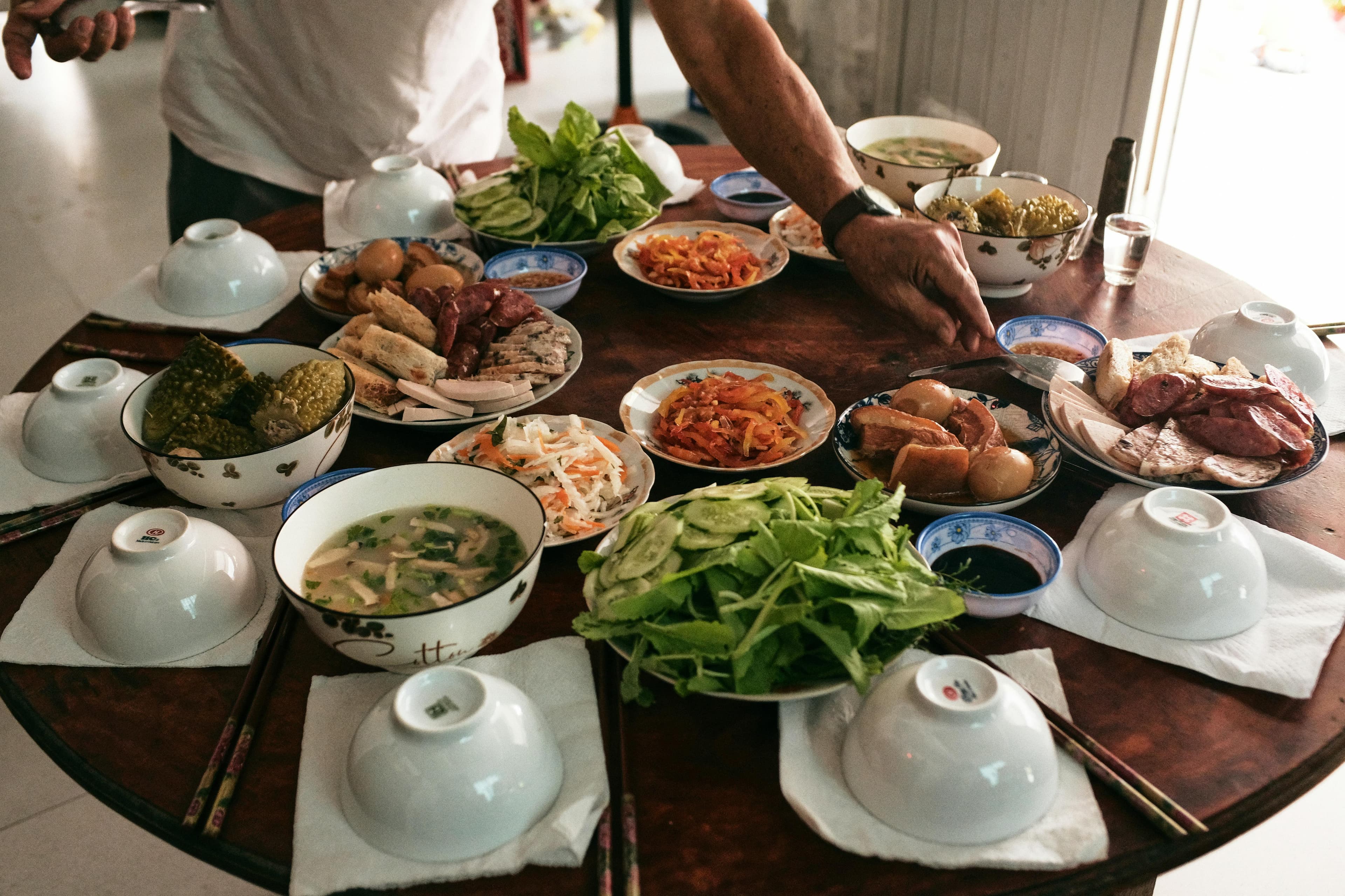 Traditional Vietnamese hotpot and street food dishes served at a local restaurant in Da Nang