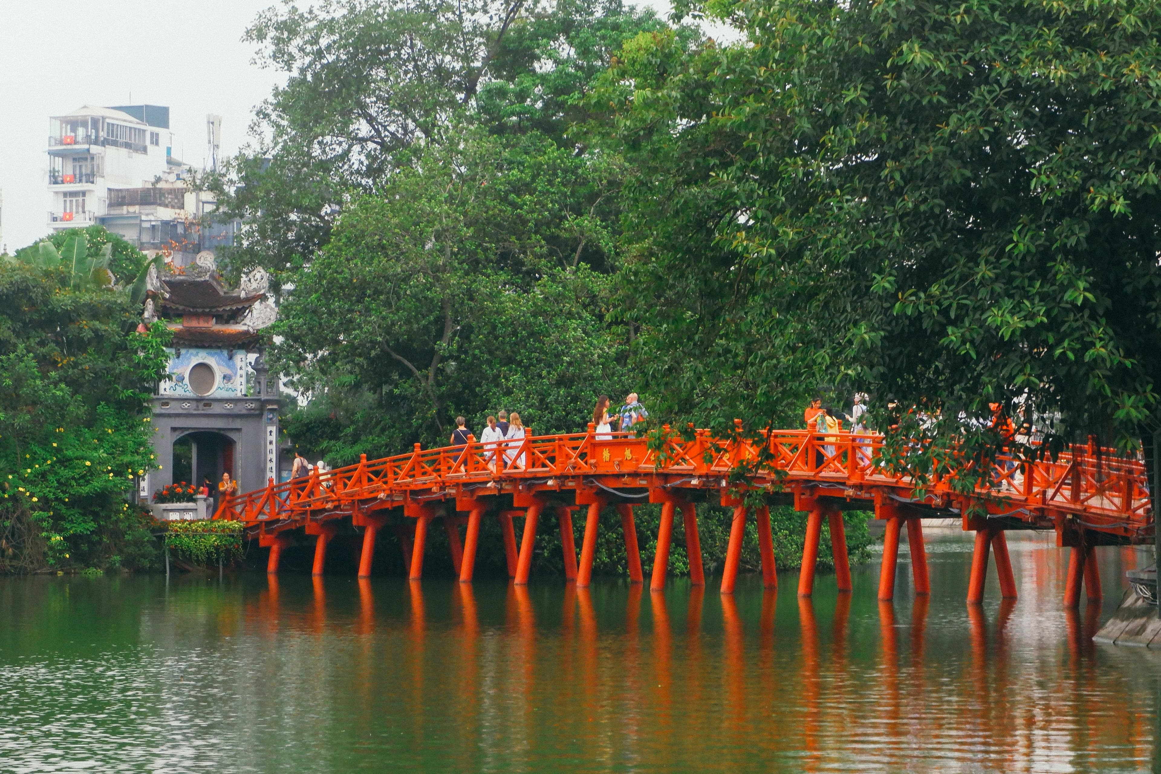 Ngoc Son Temple on Hoan Kiem Lake with red Huc Bridge in Hanoi Vietnam