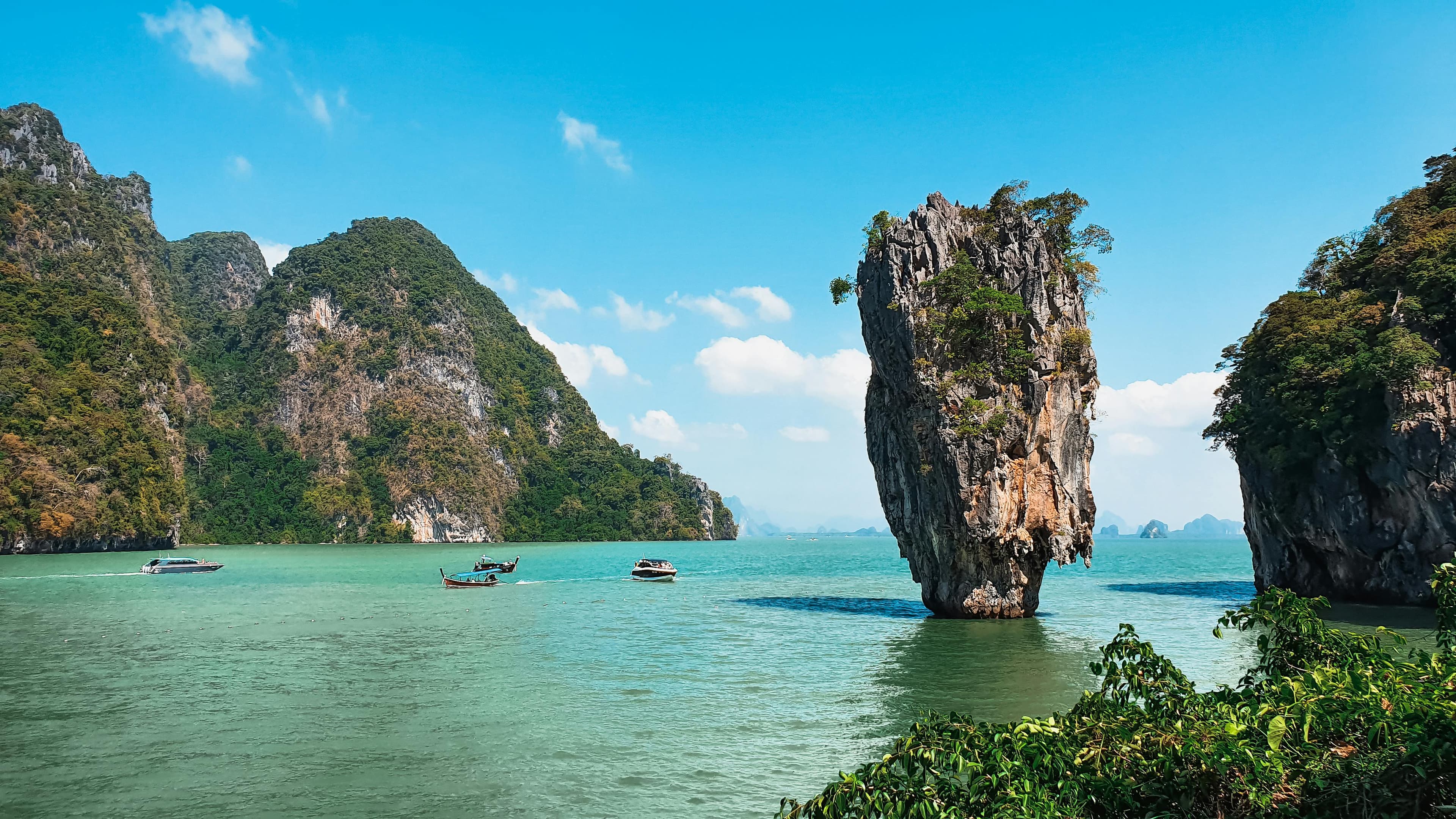 Iconic limestone karst James Bond Island rising from emerald waters in Phang Nga Bay