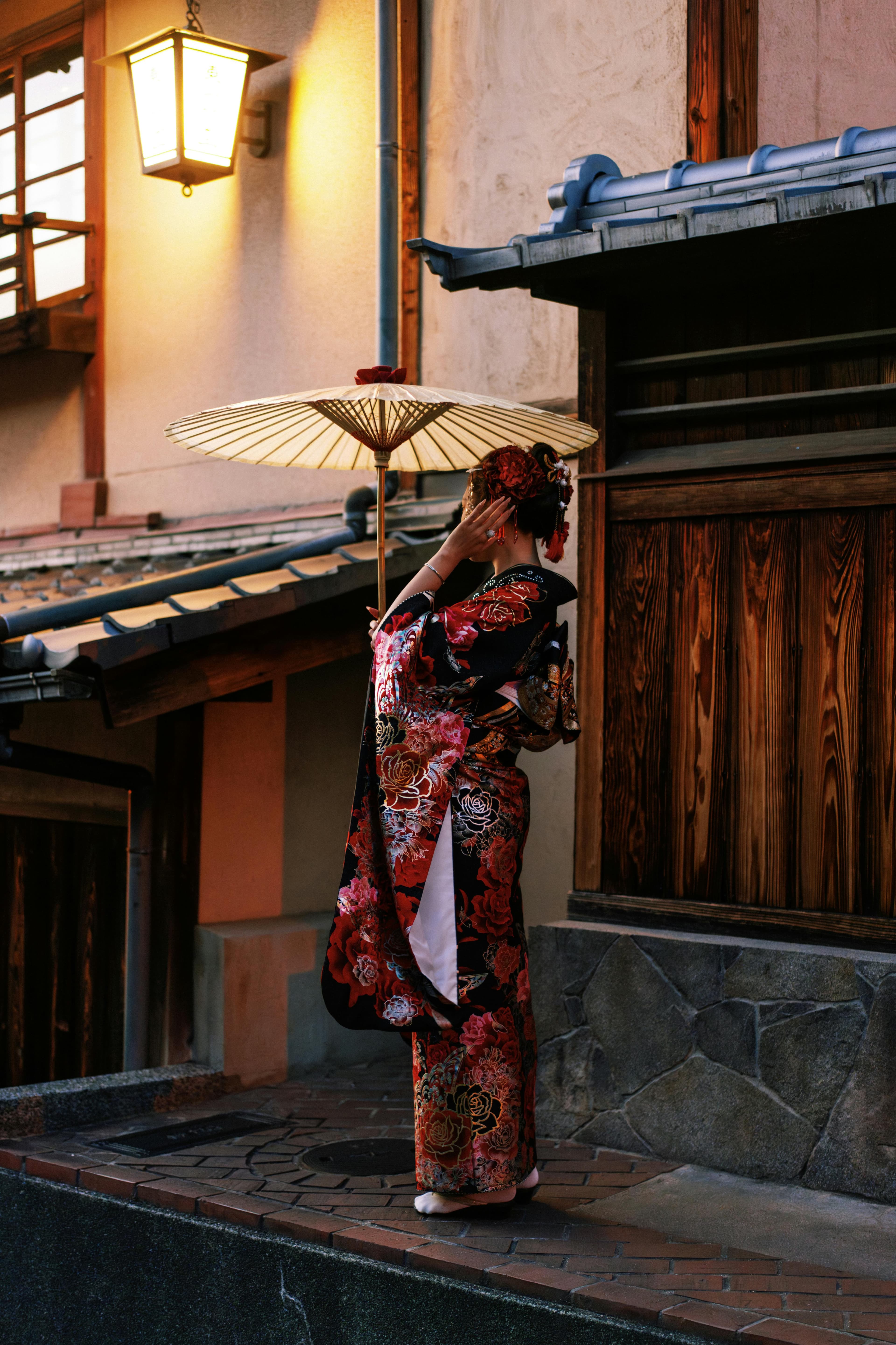Gion Geisha District Kyoto traditional wooden machiya houses lantern lit night street