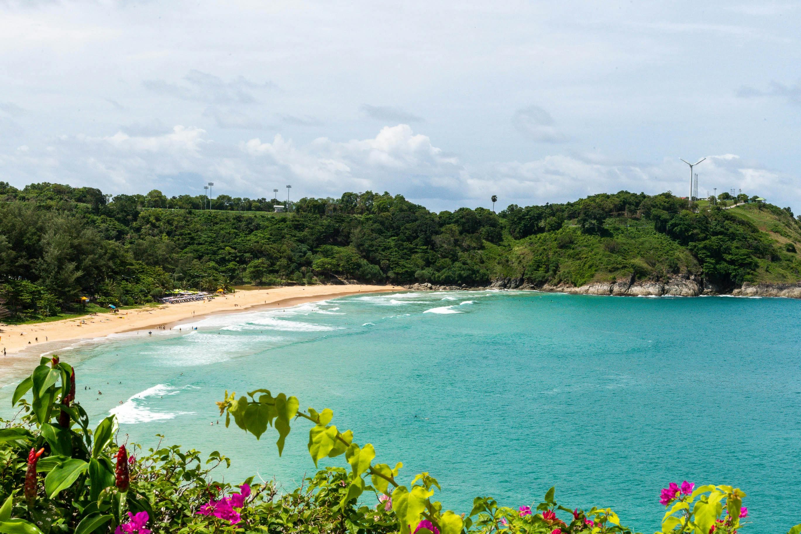 Crystal clear turquoise waters and white sand beach at Racha Island near Phuket