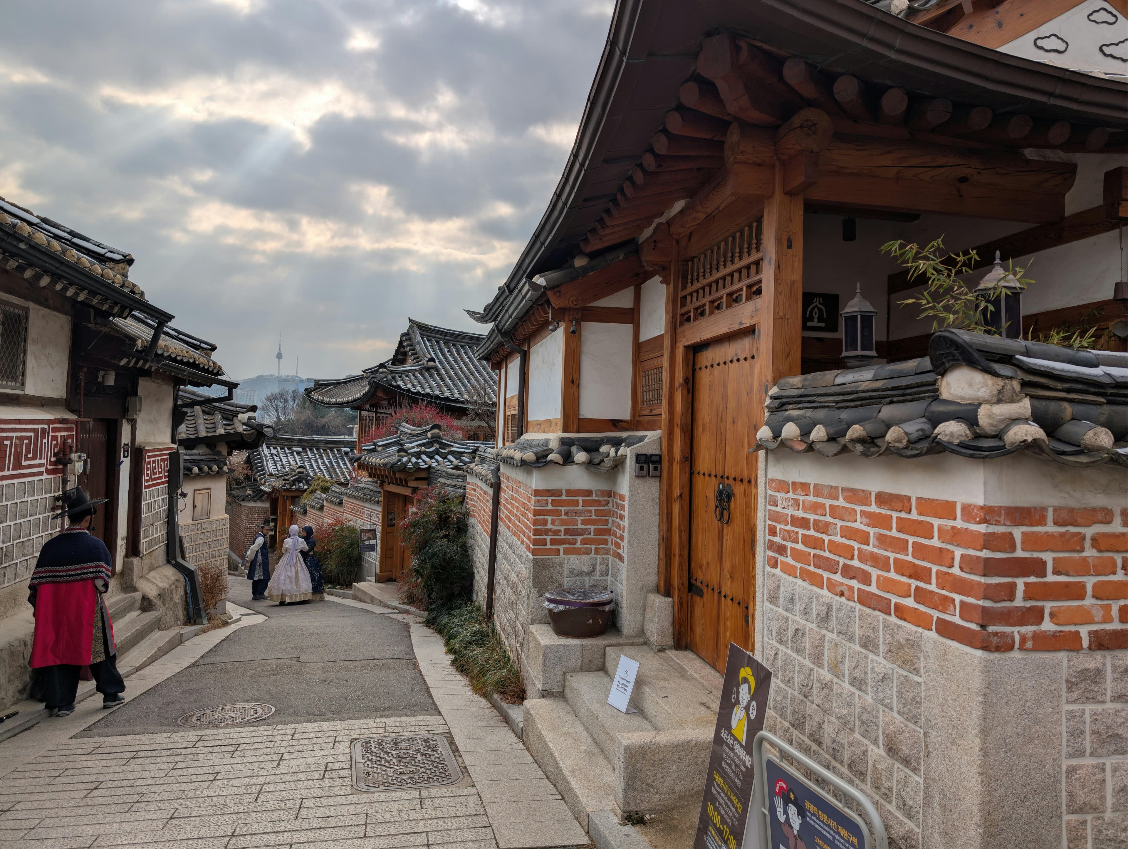 Traditional Korean hanok houses with curved rooflines and wooden architecture in Bukchon village Seoul