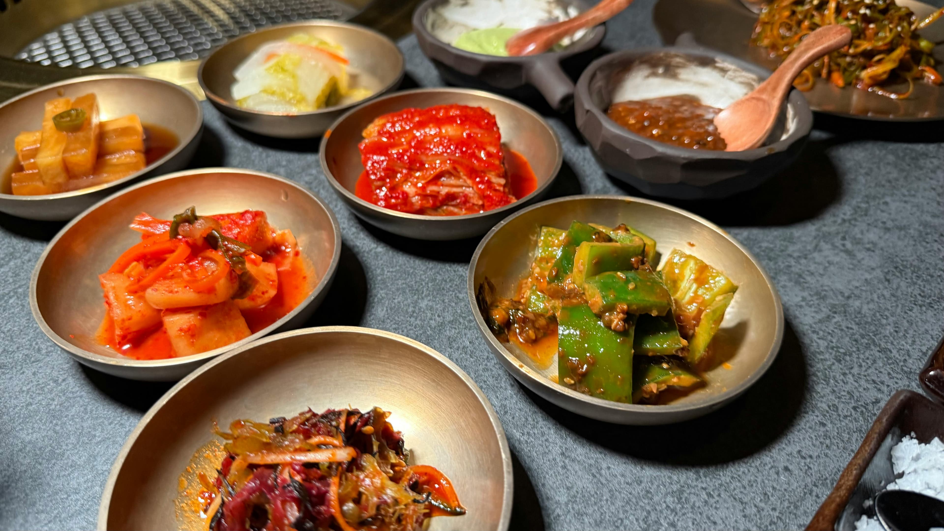 Korean cooking class with traditional ingredients, kimchi preparation, and temple food in Seoul kitchen
