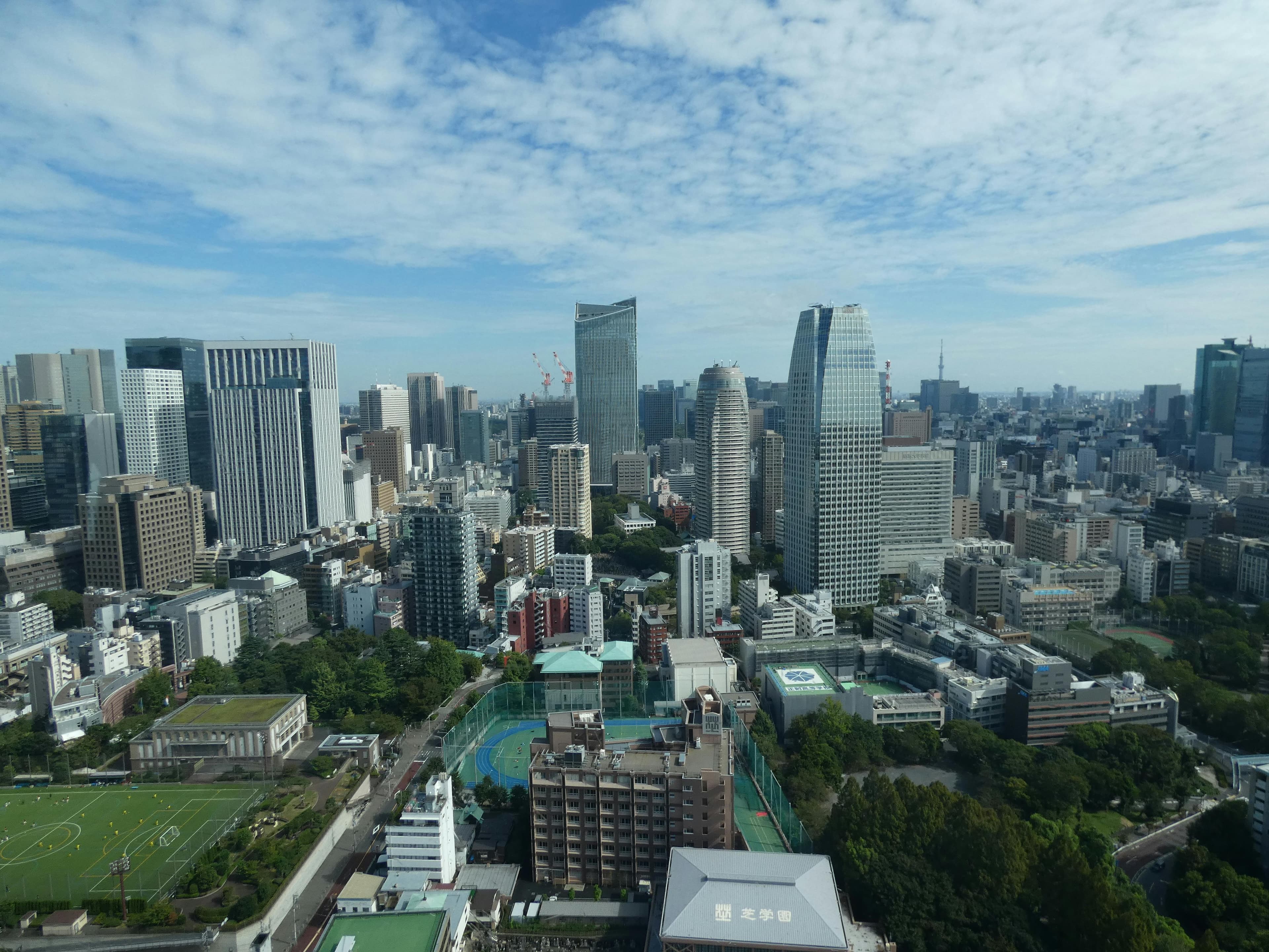 Roppongi Tokyo Mori Tower skyline with modern architecture illuminated at blue hour