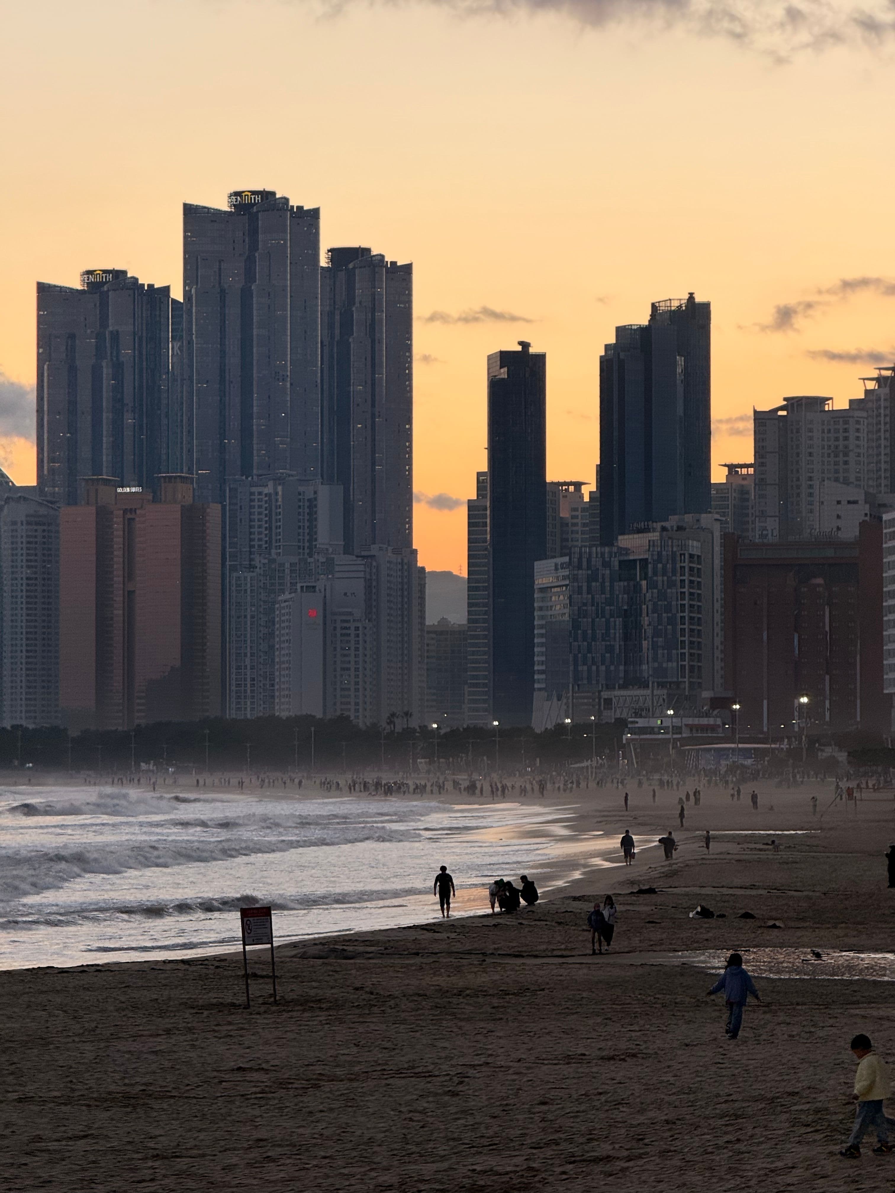 Busan Haeundae Beach sunset skyline 2026